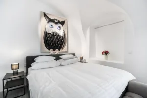 Image of Suiten Apartment Art Collection With Kind Bed Air Conditioning and two Separate Bedrooms
