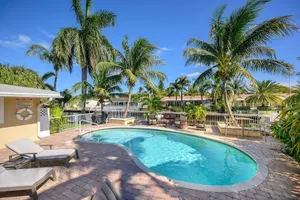 Image of Gorgeous Canal W/ Private Pool & Dock 3 Bedroom Home