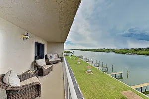 Image of New Listing! Waterfront W/ Pool & Dock 2 Bedroom Condo
