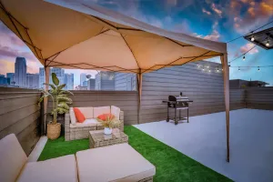 Image of Cozysuites Luxe 3BR Uptown Home Great Rooftop