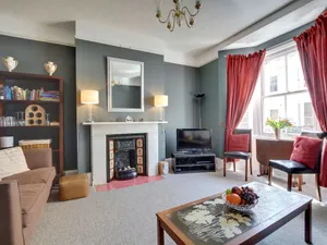 Image of Apartment in Old-style With bay Window, a Modern Kitchen and a Warm Chimney