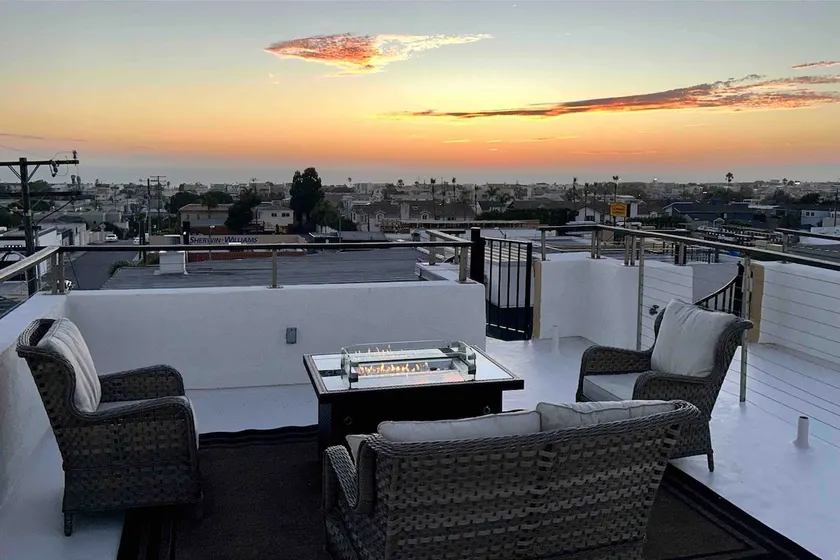 Ocean Sunset Rooftop - Image 1