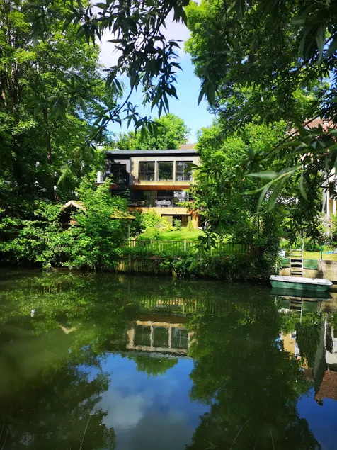 Exceptional Riverside House with Stunning Views - Image 1