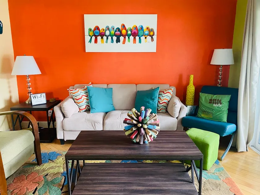 Colorful condo with heated pool and private WiFi - Image 1