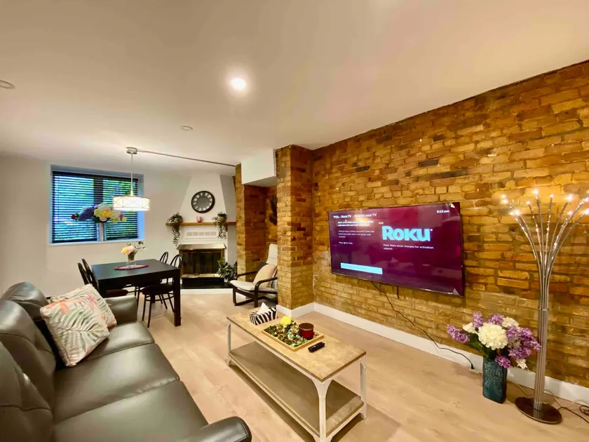 Cute and Warm 2-Bedroom Suite with Parking - Image 1