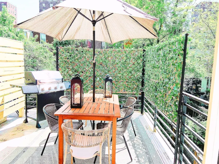 Urban Serenity, Harlem Brownstone Duplex w/ Patio - Image 1