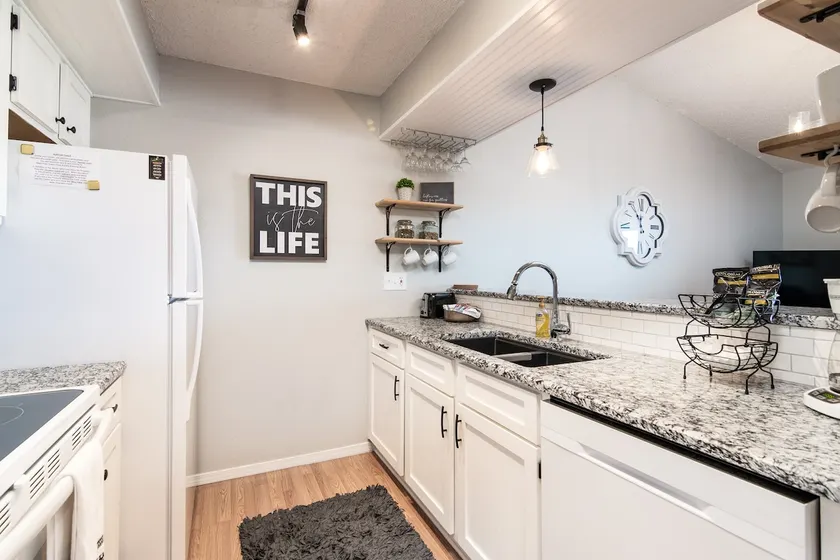 Uniquely Designed Condo Steps Away from Pool! - Image 1