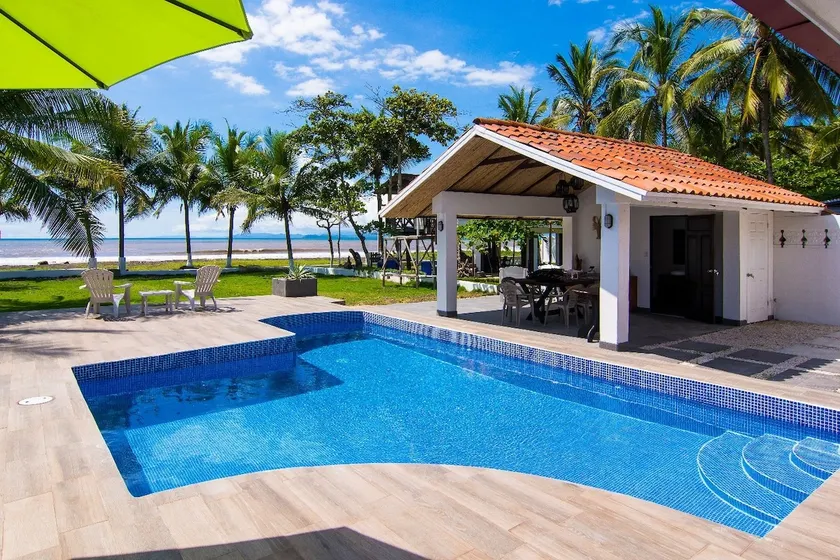 Beachfront dog-friendly home with private pool, grill, hammocks, & beach access - Image 1