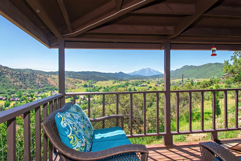 Hillside Cabin w/ wrap around porch w/ mtn views - Image 1