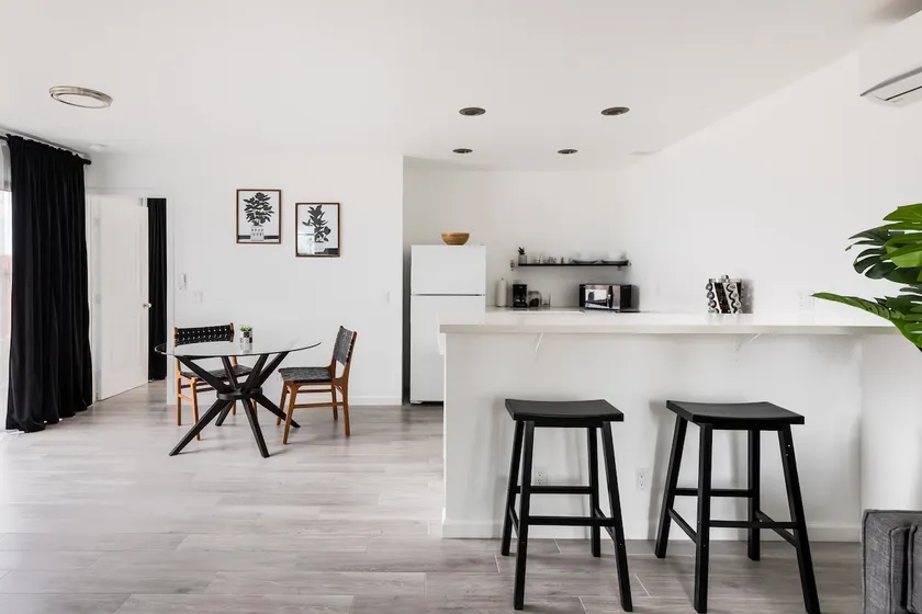Striking Black & White Apt w Gated Entrance & Yard - Image 1