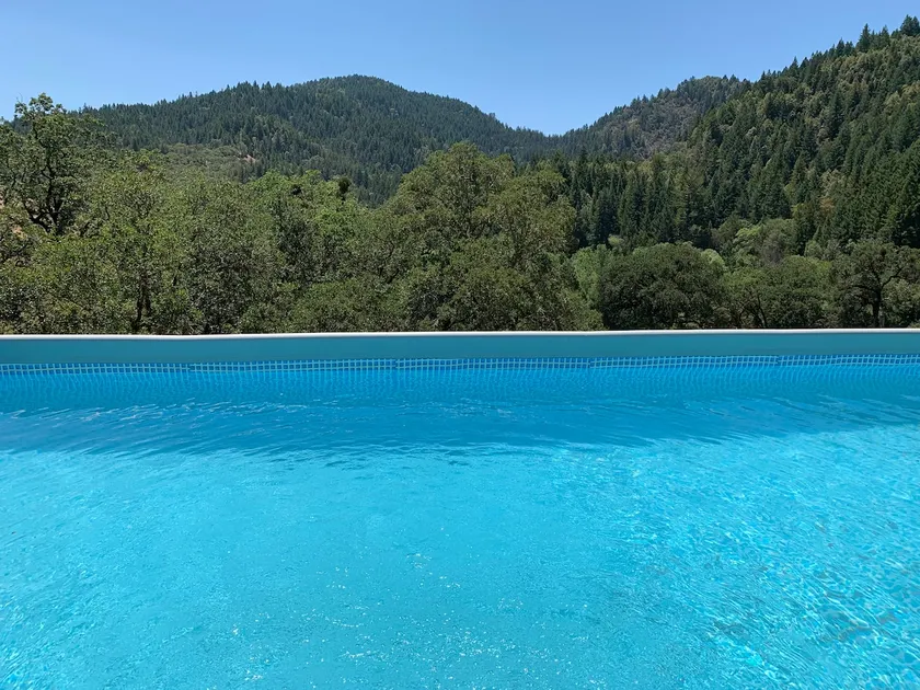 Stunning large/open home on 50 ac, views, pool! - Image 1