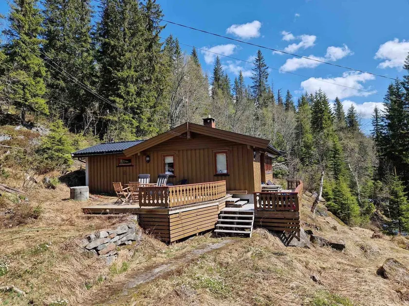 Cozy cabin in mountain environment - Image 1
