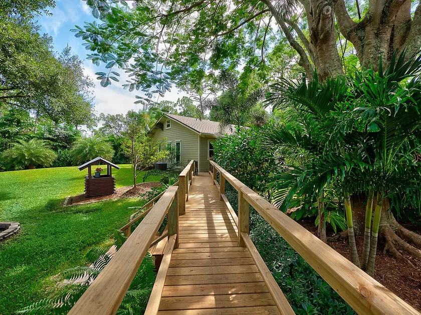 Jupiter Farms Tropical Oasis with Lush Landscaping - Image 1