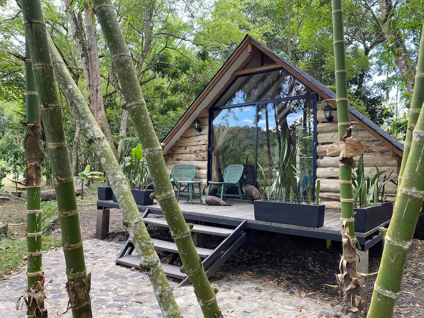 Beautiful cabin next to a stream, pure nature - Image 1