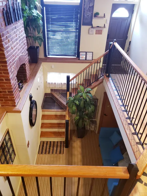 Exclusive Sunken Living Room Soaring Exposed Brick - Image 1