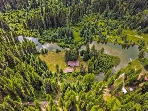 Rustic 1950's Cozy Creekside Log Cabin on 10 Acres - Image 1