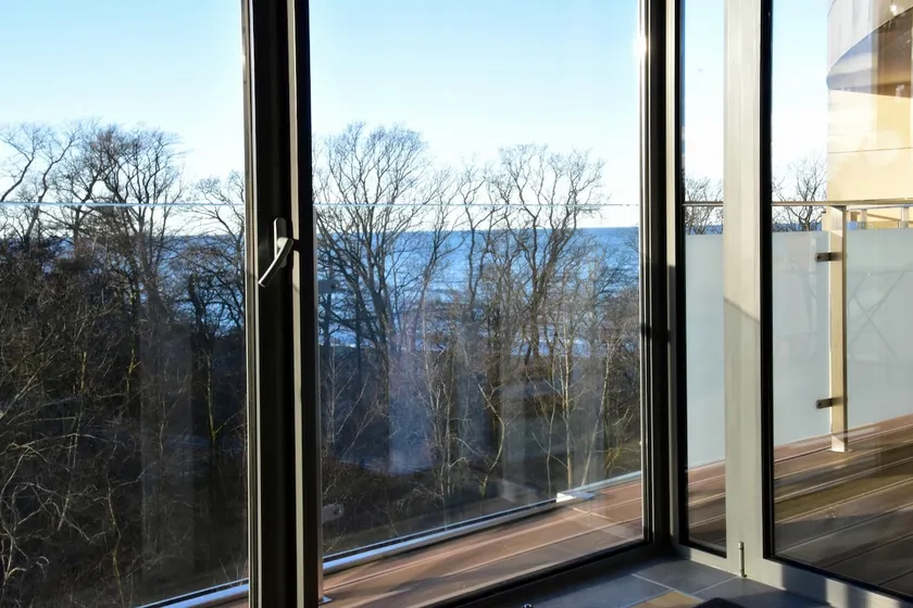 Large beachfront apartment with side view of - Image 1