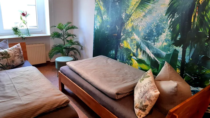 Ferienwohnung 1 - Fam. Schmidt Tropical Bedroom - Image 1