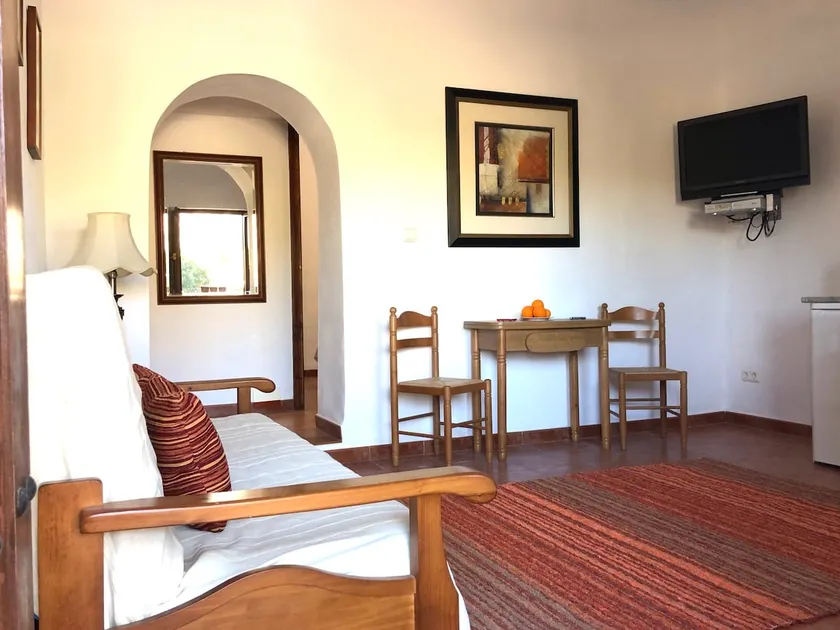 Orange Farmhouse, Apartment with king bed and sofa. - Image 1