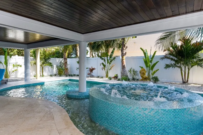 A100 step to the sugar sand gulf front view & pool - Image 1