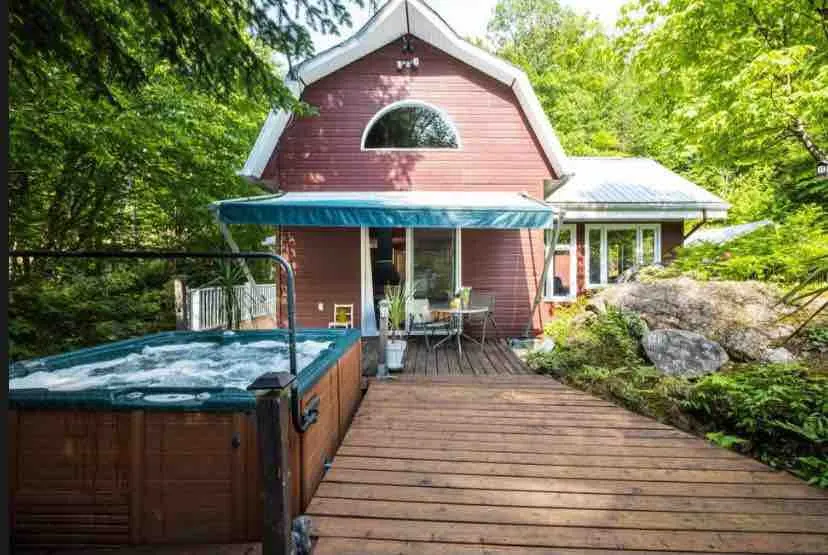 Cottage by River Falls with Hot Tub & Sauna - Image 1