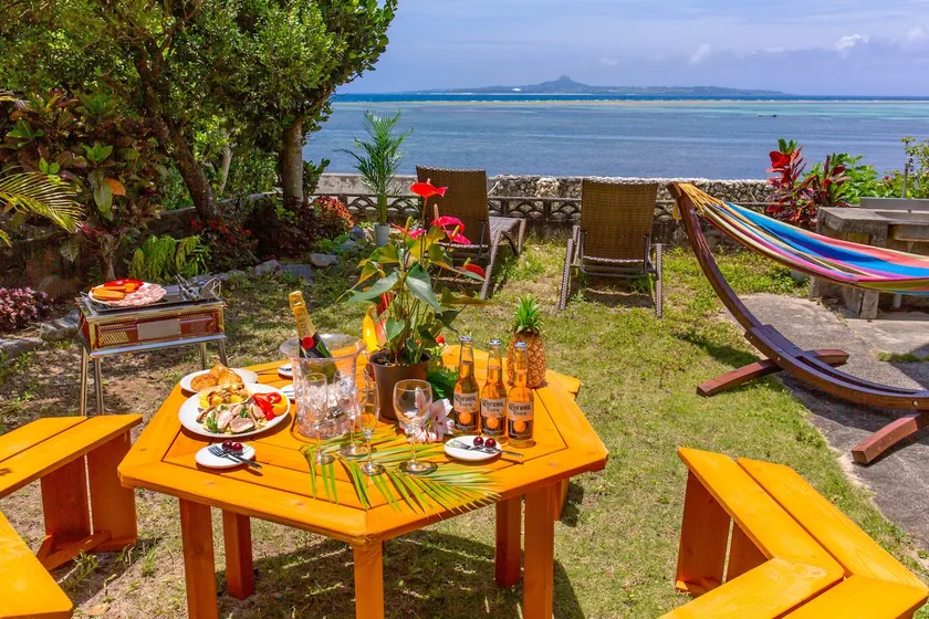 In front of you is the beach where sea turtles come to lay their eggs! Sunset Ocean view BBQ in the Fukugi trees of Bise! - Image 1