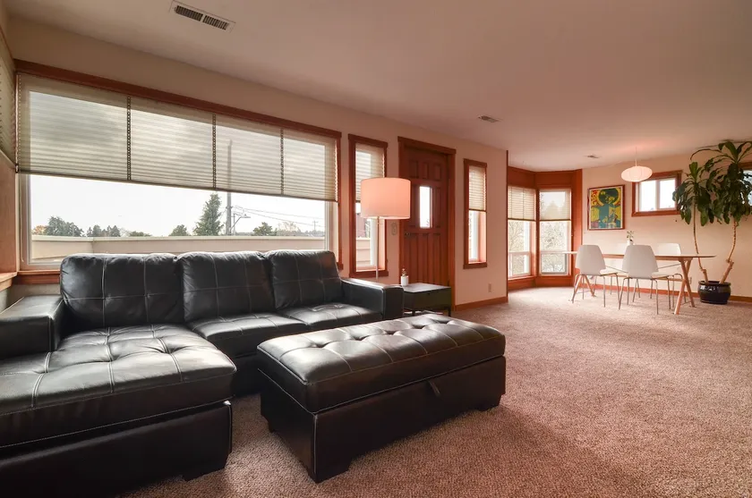 Serene Sun-filled Urban Escape with Lake Views! - Image 1