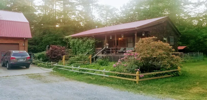 Cozy Log Cabin in the Woods - Image 1