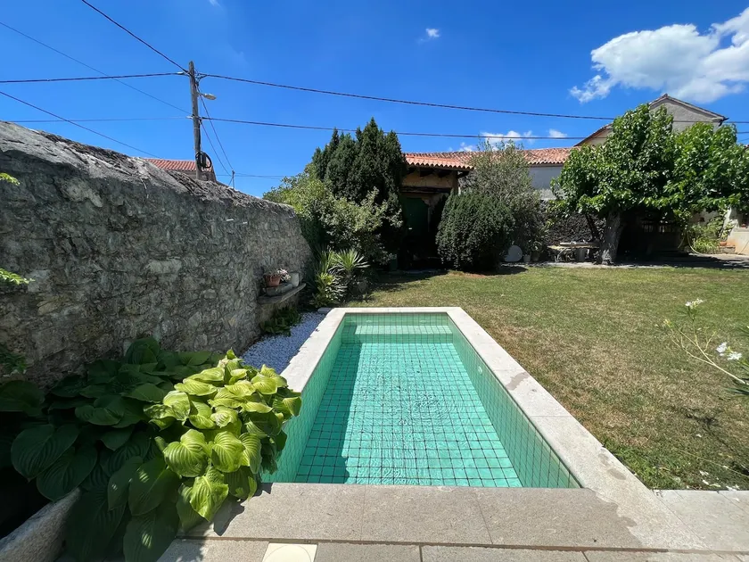 Adorable guesthouse with a pool - Image 1