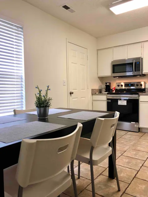 Spacious 2BR Townhome: Walkable, Parking, NearI-49 - Image 1