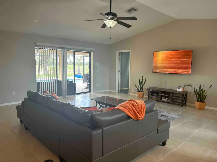 Sunny Florida Retreat 3BR, 2BA Heated Pool - Image 1