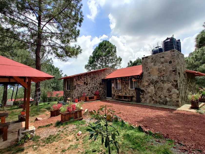 Eco-Friendly Stone Cabin - Image 1