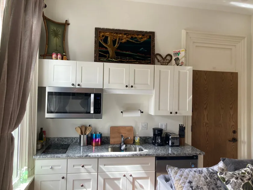 Enchanting efficiency with kitchenette and bath - Image 1
