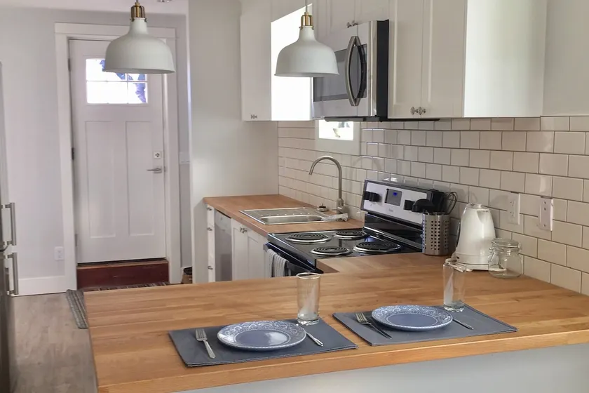Bright two bedroom suite in character home - Image 1