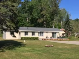”The Yellow House” - Mullett Lake - Image 1