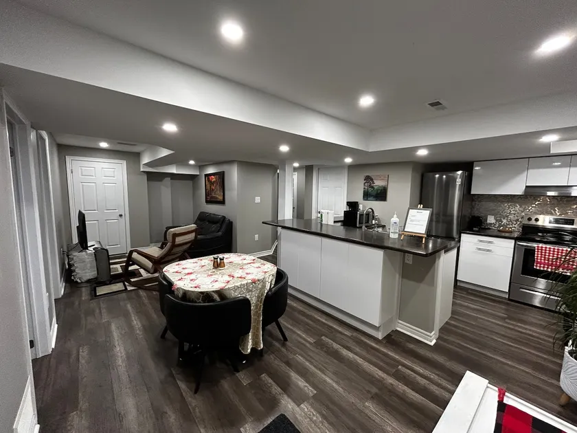 Adorable 2 Bedroom legal basement with two parking - Image 1