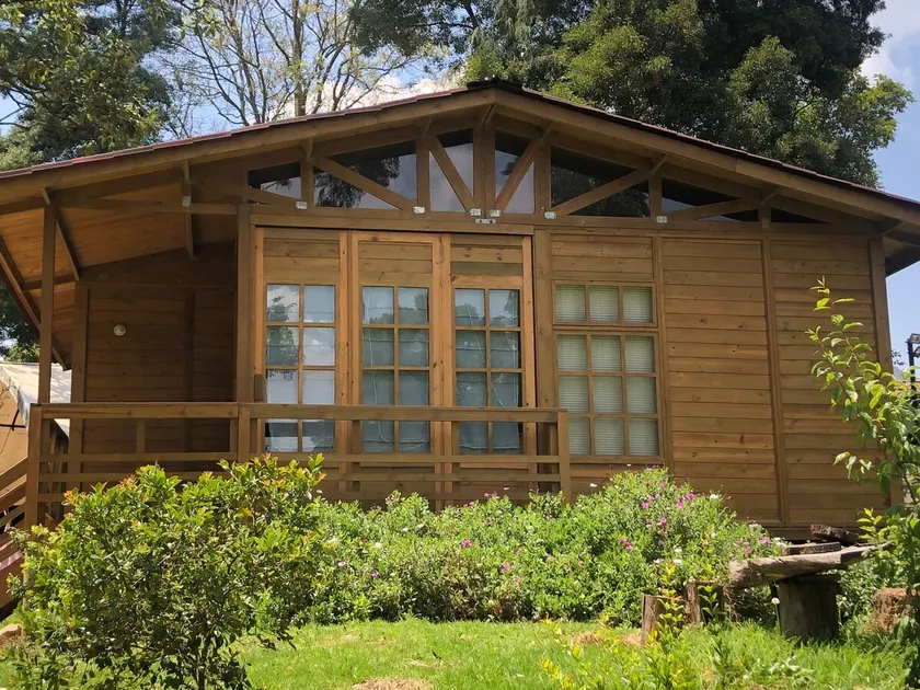 A nice cabin with a garden. - Image 1