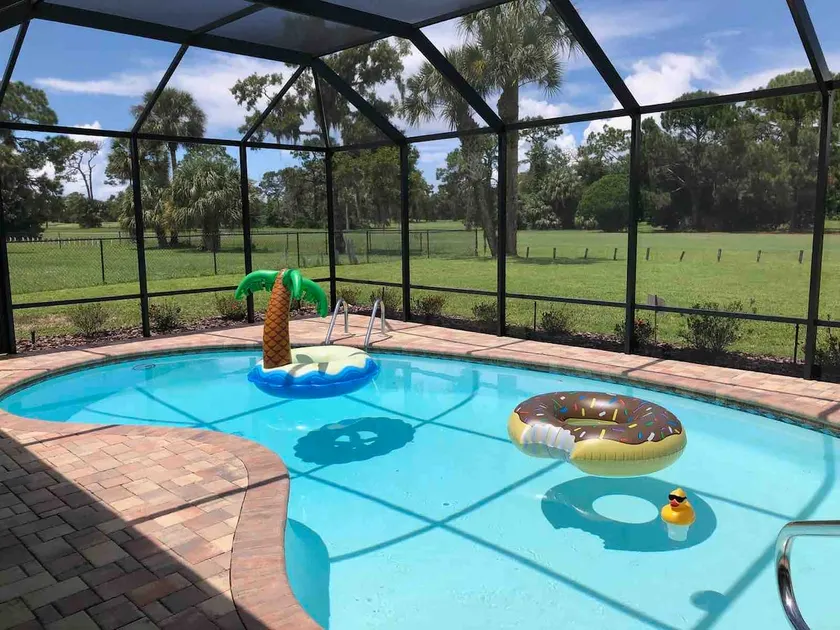Plantation Golf Course Pool Home - Image 1