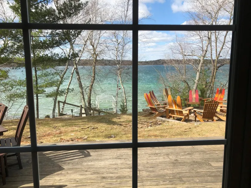 Up North Cabin on clear sand-bottom Duck Lake - Image 1