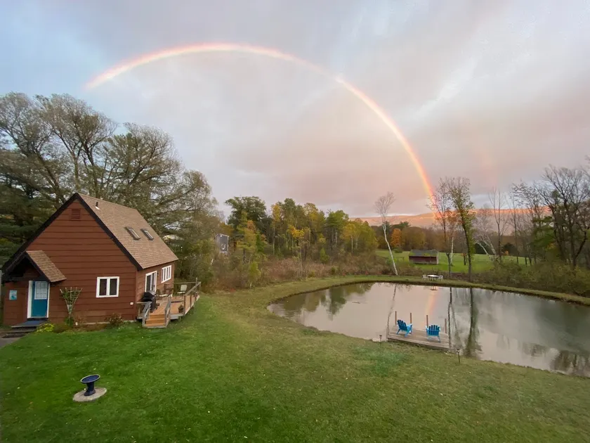 Home with a spring-fed pond and mountain view. - Image 1