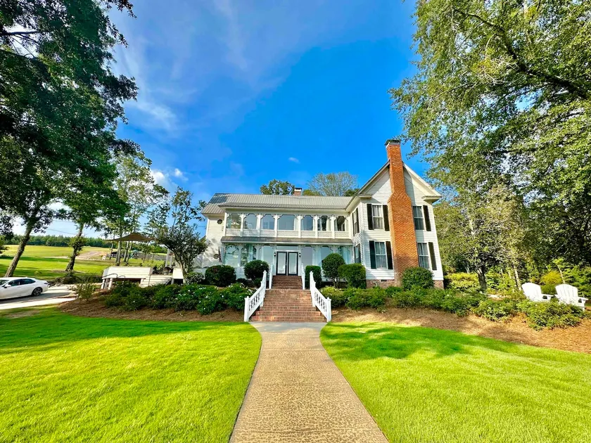 “The Magnolia House” LakeFront Compound Sleeps 58+! Pool, Hottub, kayaks, &more! - Image 1