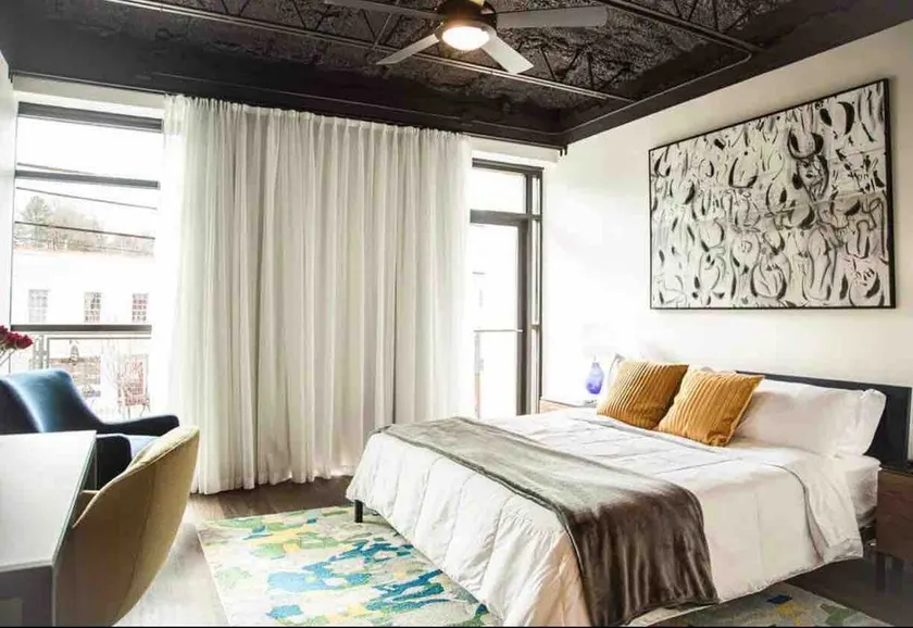 The Lofts Suite #21 ”The Judge” King Bed & Balcony - Image 1