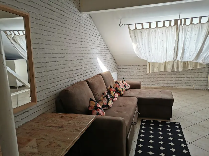 Top floor apartment with separate entrance. - Image 1