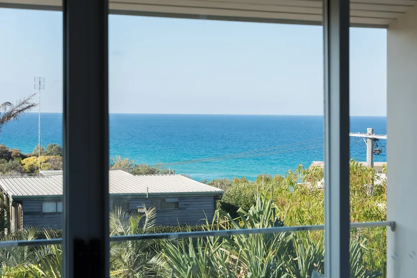 Sunrise Escape - Ocean Views, Steps to Beach - Image 1