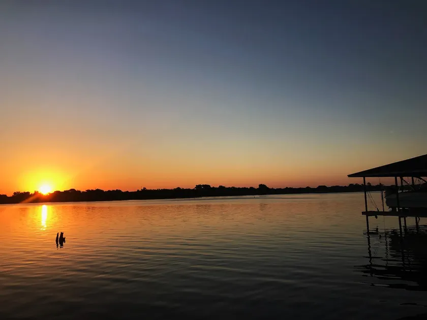 Need to relax? Do so at our lake front property. - Image 1