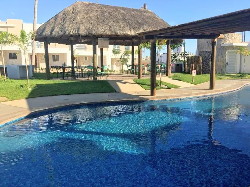 House near the beach in a private community with a pool - Image 1