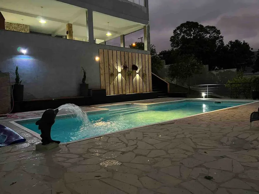House with a games room, swimming pool and barbecue area. - Image 1