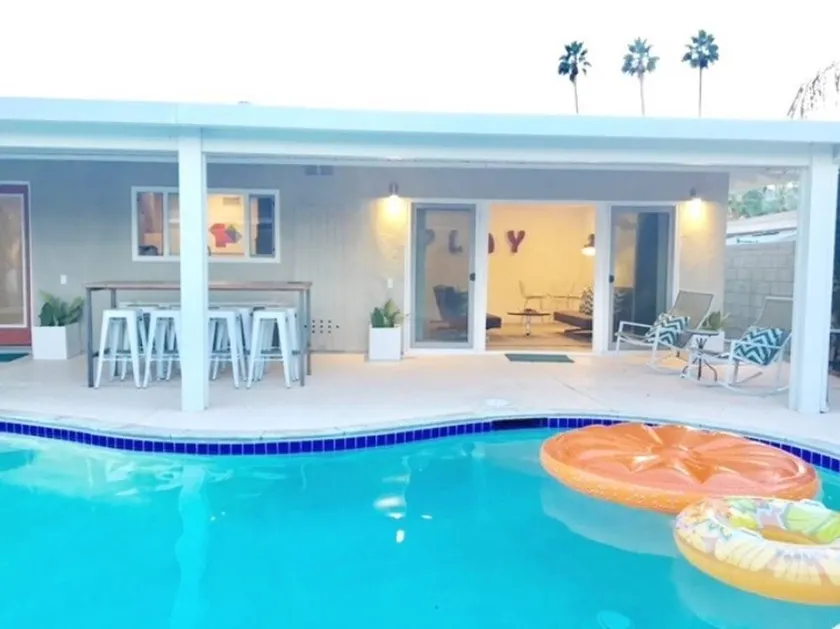 Trendy Mid-Century Home with Pool & Central to All - Image 1