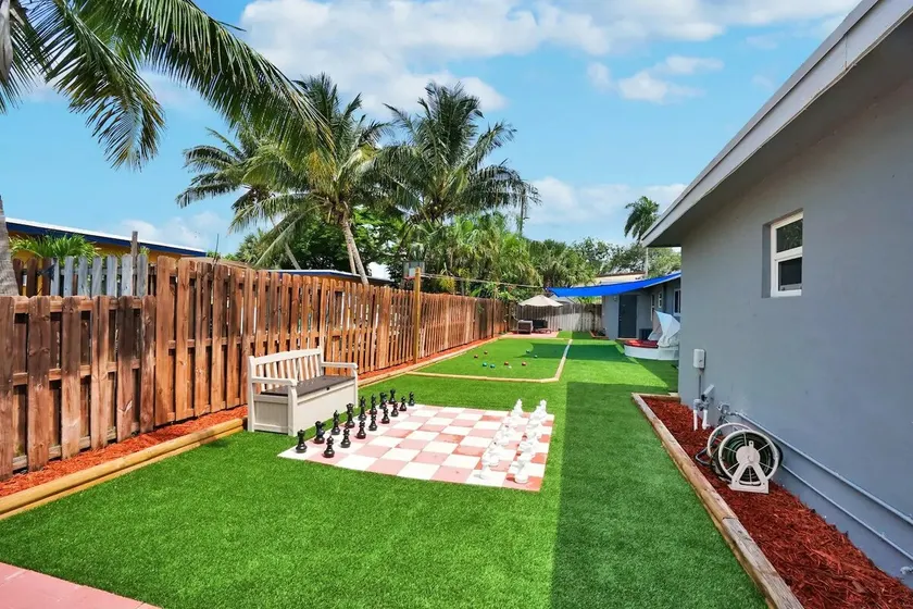 1 King & 1 Queen, Backyard Fun, Large Smart TV - Image 1