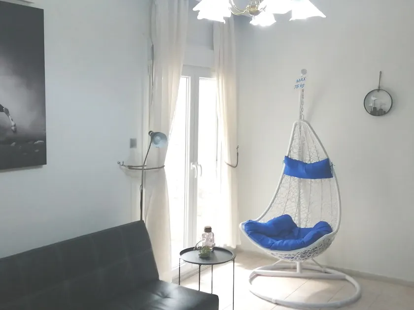 Blue swing chair apartment - Image 1
